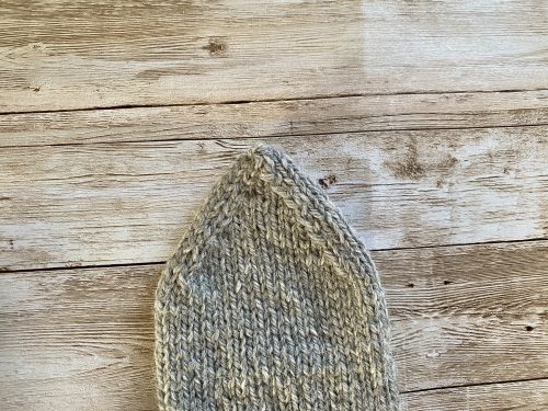 Close-up of the Elina mittens showcasing neat decreases and textured details.