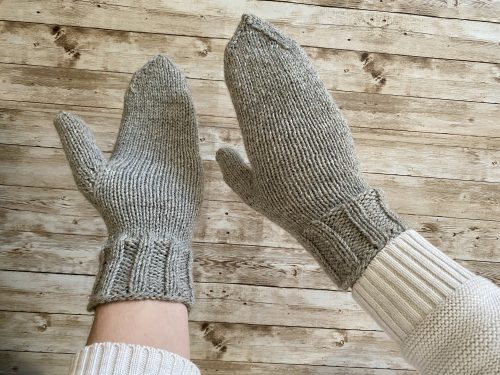 Cozy hands wearing the Elina mittens, a perfect blend of warmth and style.