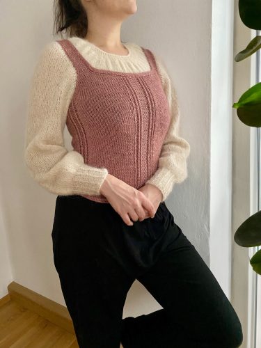 Me wearing the Edoras Sweater, showcasing its romantic and timeless design