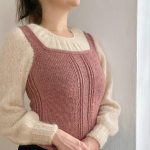 Hand-knit garment combining Drops Brushed Alpaca Silk and Drops Nepal yarns, showcasing a soft, fluffy texture and subtle sheen, ideal for creating lightweight yet warm and cozy attire.