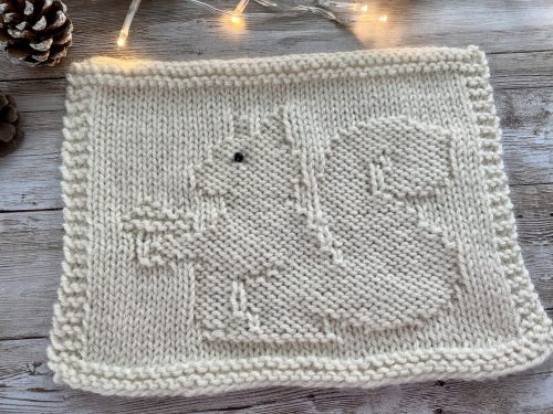 The finished Squirrel Square on a wooden surface