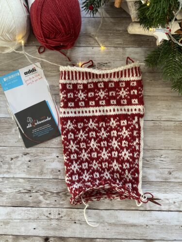 Hand-knit red and white Christmas socks with Lang Yarns Super Soxx
