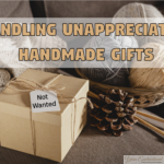 A kraft paper gift box tied with twine, featuring a tag that says "Not Wanted," placed next to a basket of yarn and knitting needles, with the text overlay "Handling Unappreciated Handmade Gifts.